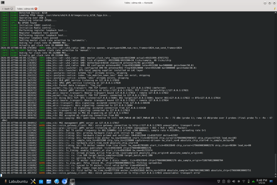 A Linux terminal running a CDMA 1x base station stack over a USRP B210, showing UHD device init and call signaling logs.